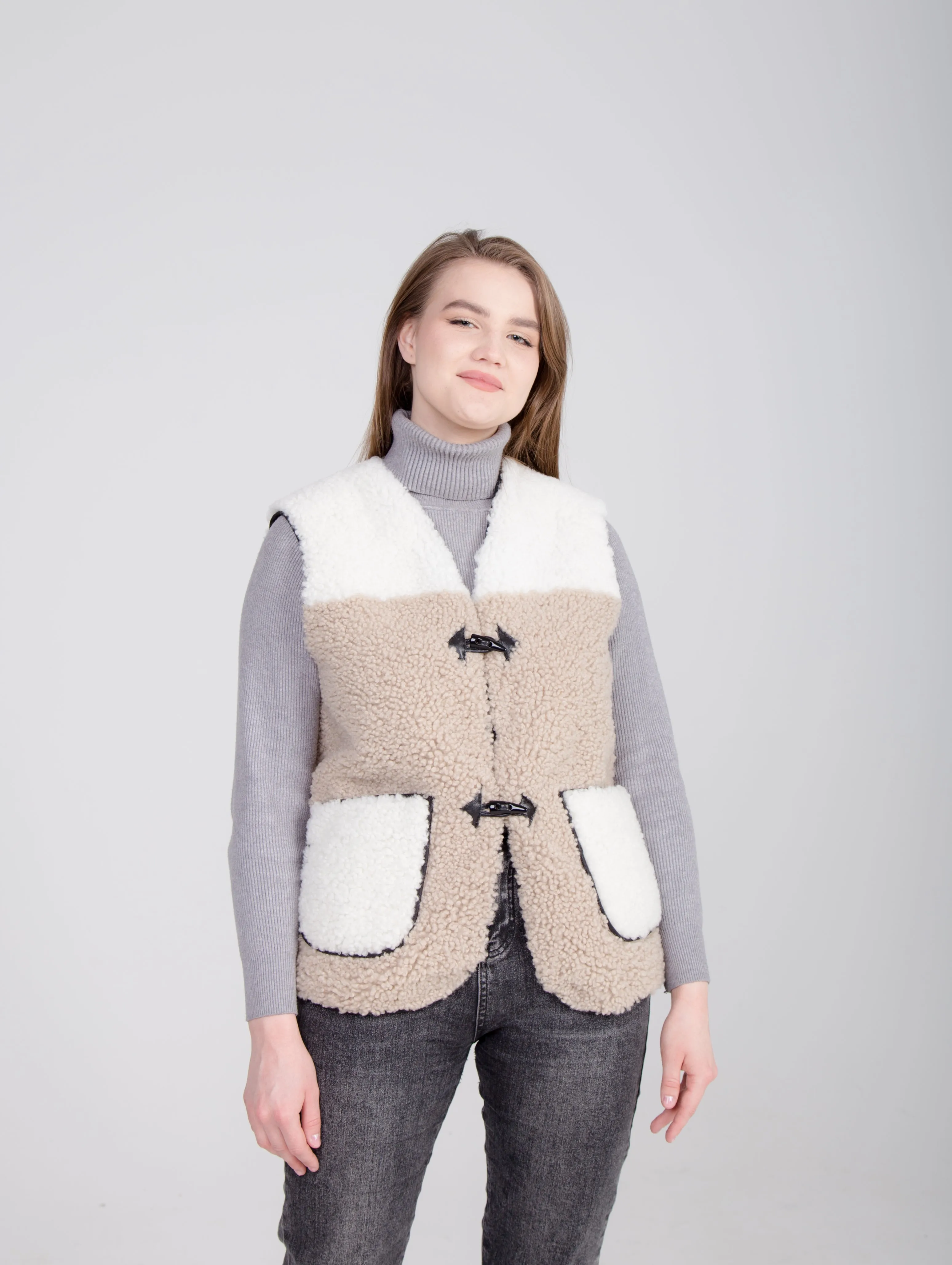 Two-Colored Beige Womens Shearling Vest with Leather Patch Buckle Buttons